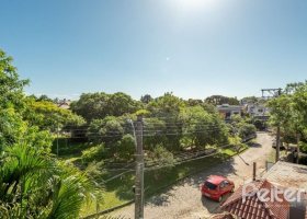 Casa em Condomínio à venda com 162m², 3 dormitórios, 1 suíte, 2 vagas, no bairro Vila Assuncao em PORTO ALEGRE