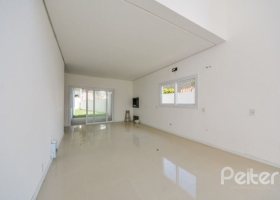 Casa à venda com 267m², 3 dormitórios, 1 suíte, 3 vagas, no bairro Vila Conceição em Porto Alegre