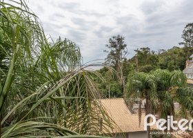 Casa em Condomínio à venda com 223m², 3 dormitórios, 1 suíte, 2 vagas, no bairro Jardim Isabel em Porto Alegre