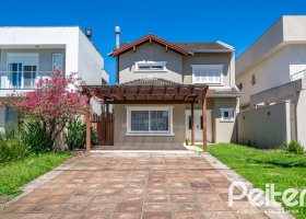 Casa em Condomínio à venda com 217m², 3 dormitórios, 1 suíte, 2 vagas, no bairro Terra Ville em Porto Alegre