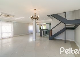 Casa em Condomínio à venda com 217m², 3 dormitórios, 1 suíte, 2 vagas, no bairro Terra Ville em Porto Alegre