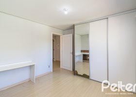 Casa em Condomínio à venda com 217m², 3 dormitórios, 1 suíte, 2 vagas, no bairro Terra Ville em Porto Alegre