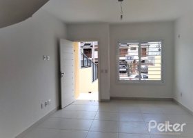 Casa à venda com 133m², 3 dormitórios, 3 suítes, 2 vagas, no bairro Guarujá em Porto Alegre