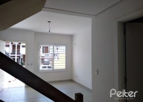 Casa à venda com 133m², 3 dormitórios, 3 suítes, 2 vagas, no bairro Guarujá em Porto Alegre