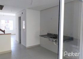 Casa à venda com 133m², 3 dormitórios, 3 suítes, 2 vagas, no bairro Guarujá em Porto Alegre