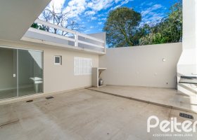 Casa em Condomínio à venda com 221m², 4 dormitórios, 1 suíte, 2 vagas, no bairro Jardim Isabel em Porto Alegre