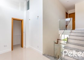 Casa em Condomínio à venda com 190m², 3 dormitórios, 1 suíte, 2 vagas, no bairro Vila Nova em PORTO ALEGRE