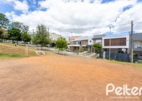 Casa em Condomínio à venda com 190m², 3 dormitórios, 1 suíte, 2 vagas, no bairro Vila Nova em PORTO ALEGRE