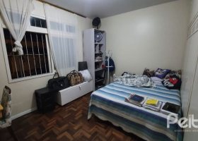 Casa à venda com 210m², 3 dormitórios, 1 suíte, 2 vagas, no bairro Guarujá em Porto Alegre