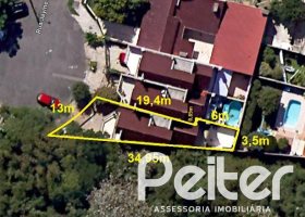 Casa à venda com 191m², 3 dormitórios, 1 suíte, 2 vagas, no bairro Guarujá em Porto Alegre