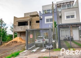 Casa à venda com 120m², 3 dormitórios, 1 suíte, 1 vaga, no bairro Guarujá em Porto Alegre