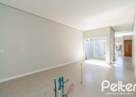 Casa em Condomínio à venda com 189m², 3 dormitórios, 3 suítes, 4 vagas, no bairro Terra Ville em PORTO ALEGRE