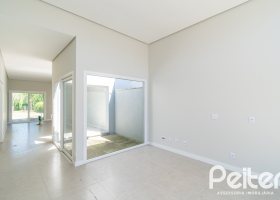 Casa em Condomínio à venda com 189m², 3 dormitórios, 3 suítes, 4 vagas, no bairro Terra Ville em PORTO ALEGRE