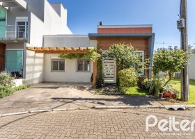 Casa em Condomínio à venda com 99m², 3 dormitórios, 1 suíte, 2 vagas, no bairro Hípica em PORTO ALEGRE